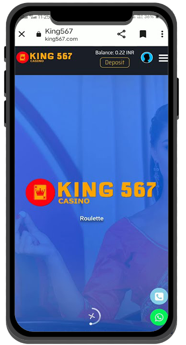 A cell phone with king 567 on the screen