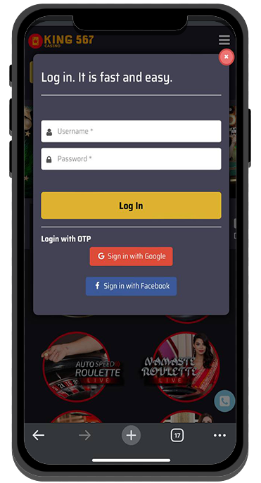 A cell phone with a casino app login on the screen